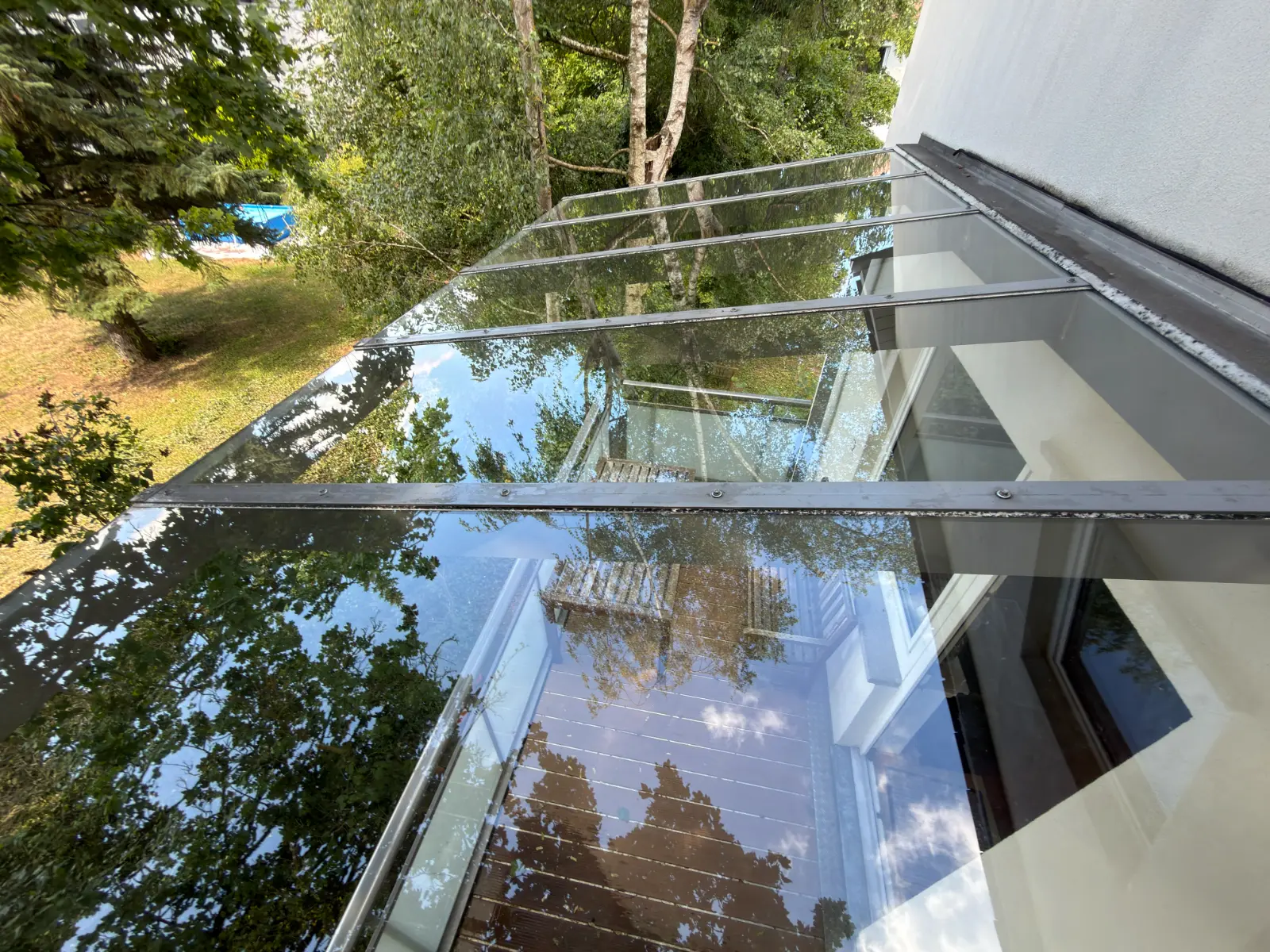 Wintergartenreinigung Glasdach sauber Terrasse Rhein-Main RELTRO